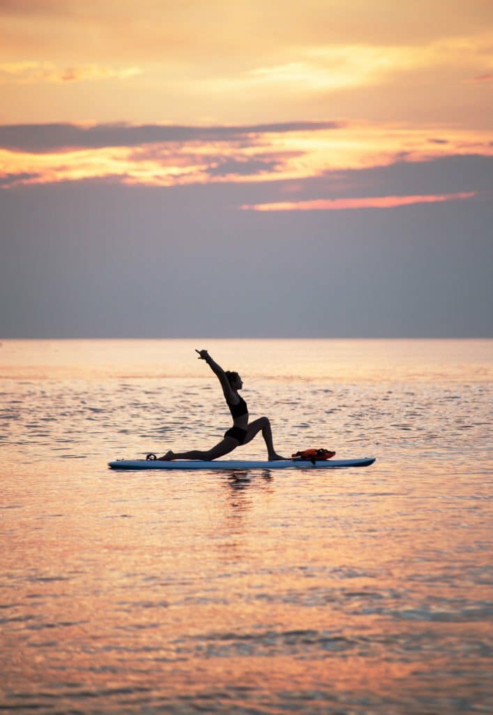 paddle board yoga